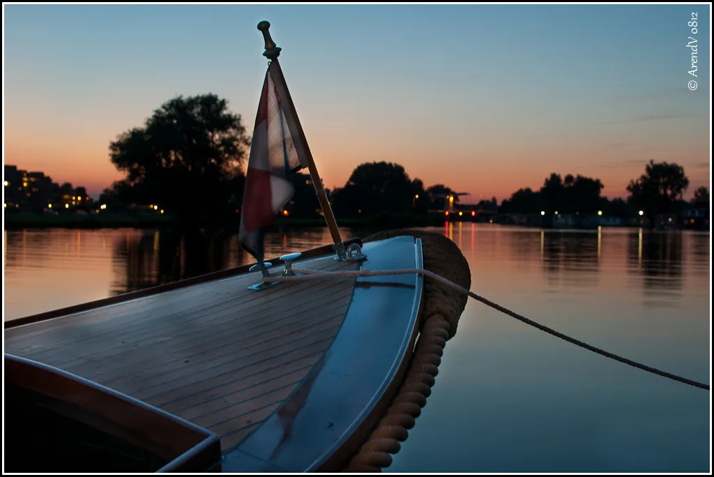 A boat on the Spaarne at sunset, Haarlem.