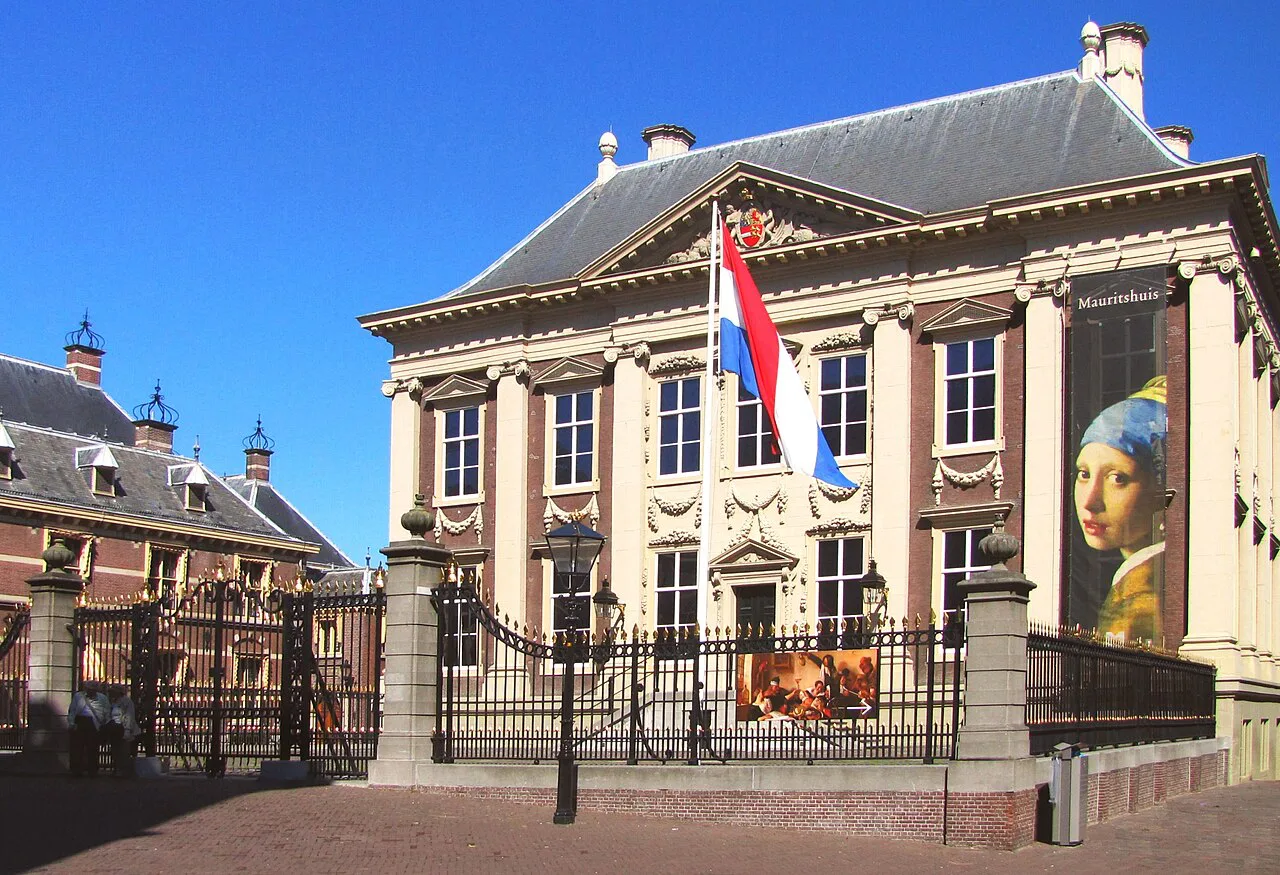 The Mauritshuis with its Girl with a Pearl Earring banner, The Hague.