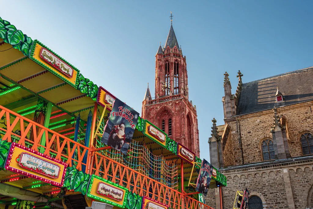 A fairground ride below St John's Church, Maastricht.