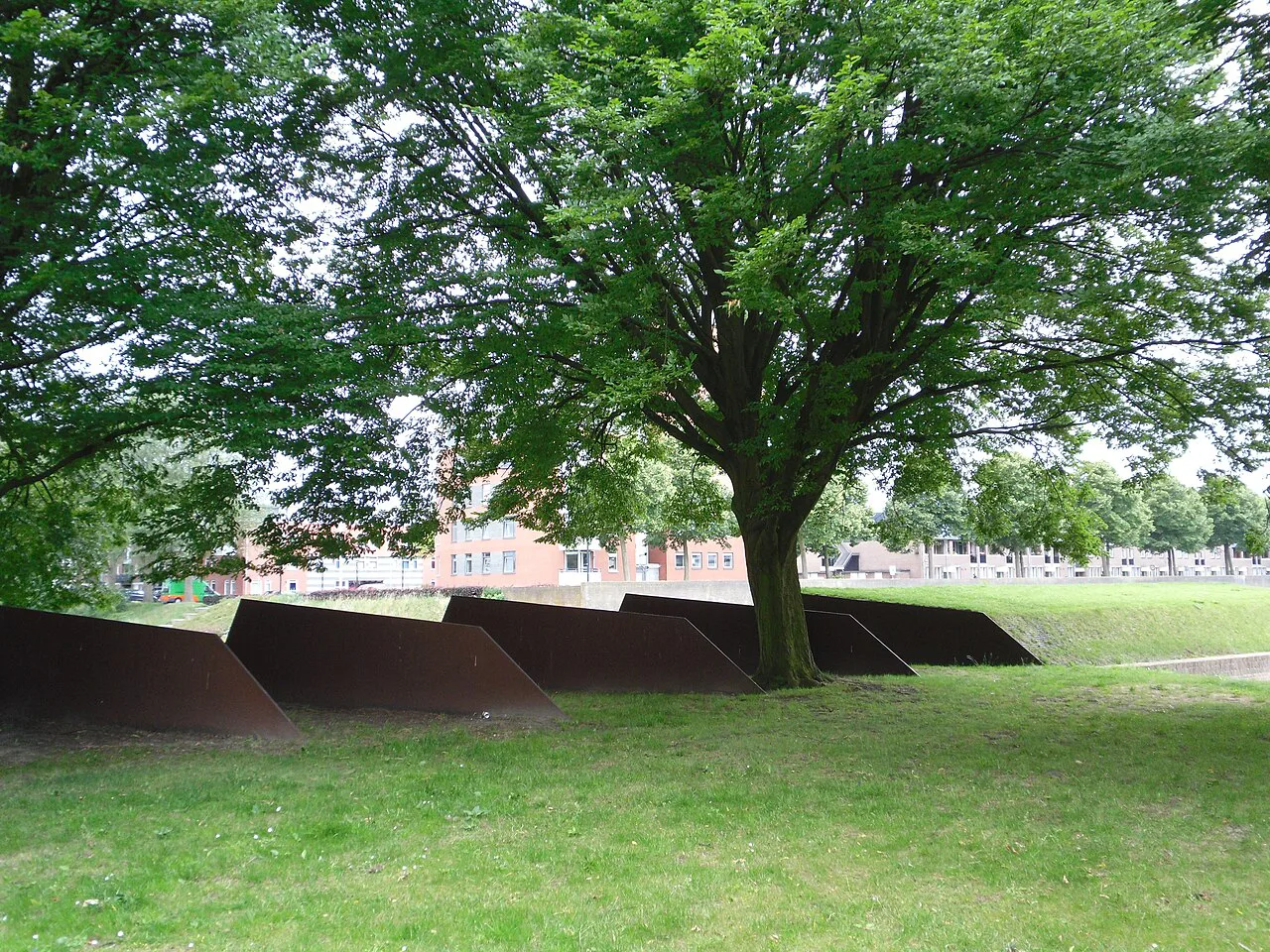 Trees and open grass in De Muntel, Den Bosch.