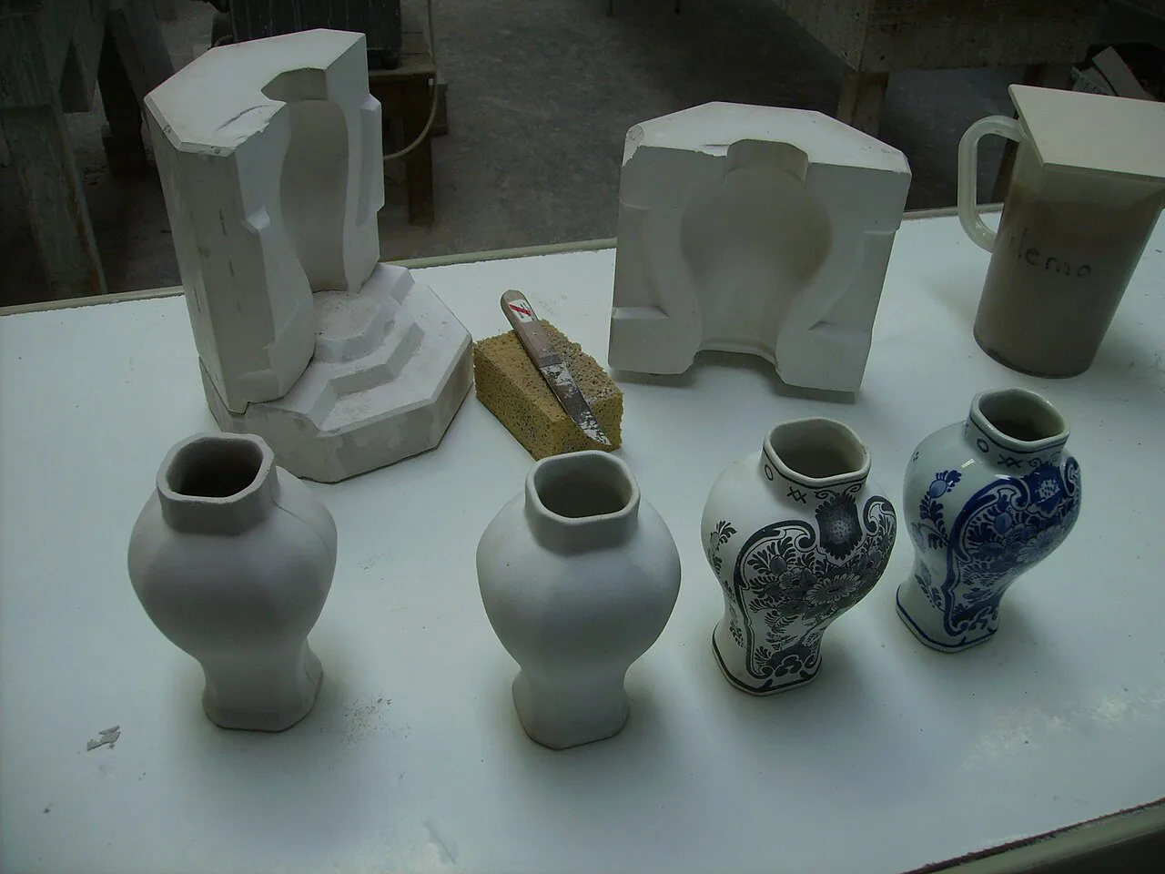 Delftware vases in production at Royal Delft.
