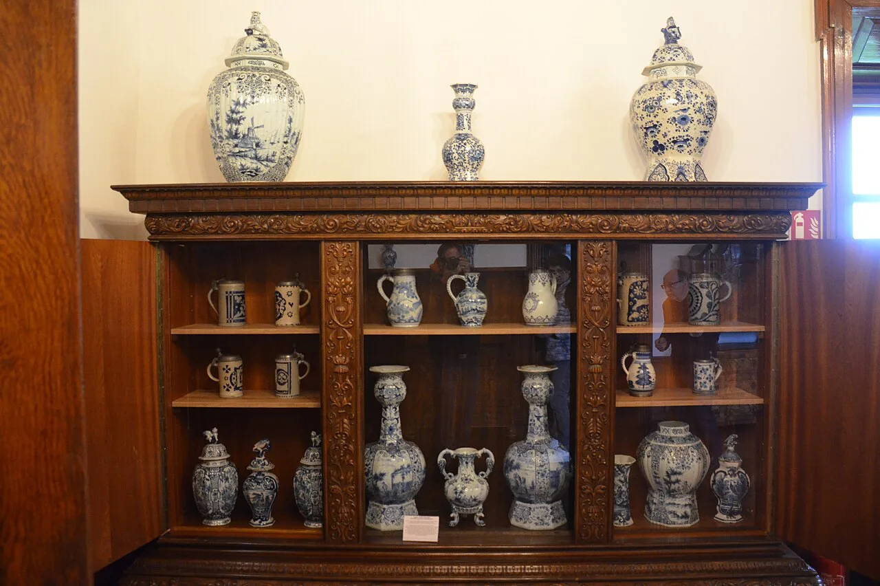 A collection of Delftware in a period room.