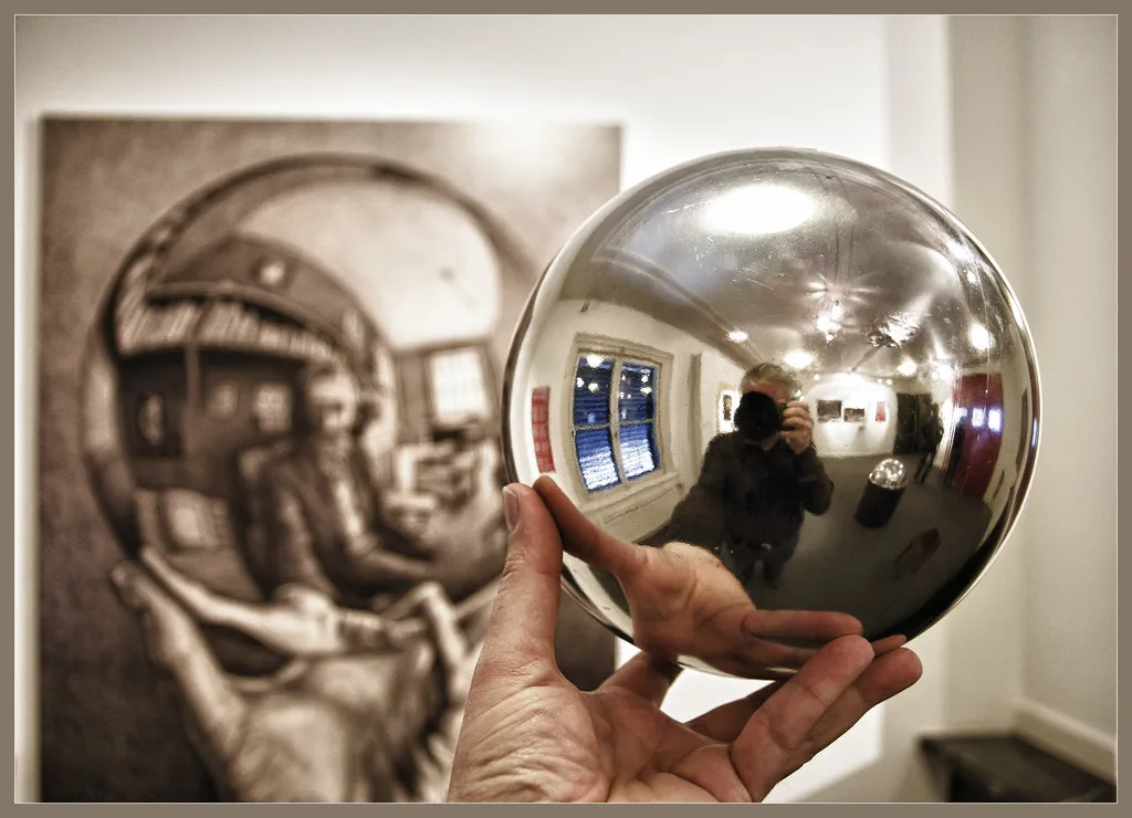 An M.C. Escher-style reflecting sphere in Escher in Het Paleis, The Hague.