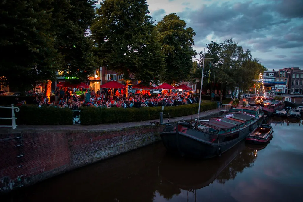 A canal side in Groningen at dusk.