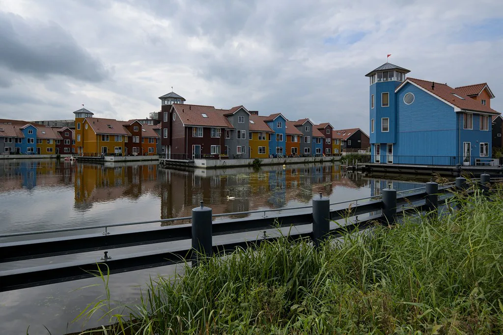 Colourful waterside houses in Groningen.