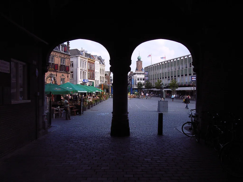 An arched passage onto a street in Nijmegen's city centre.