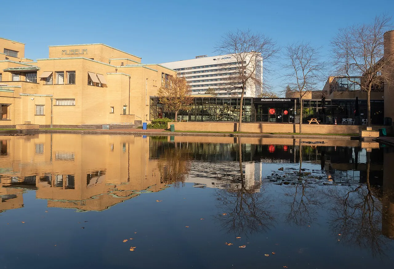 Kunstmuseum Den Haag reflected in its pond, The Hague.