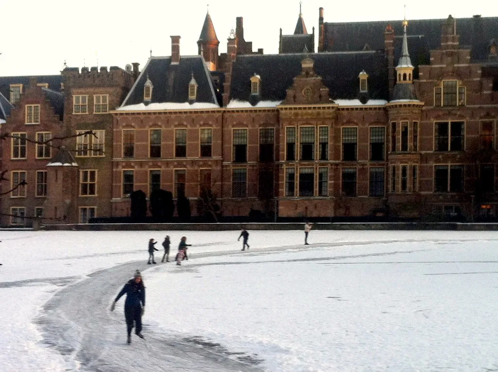 Skaters on the frozen Hofvijver, The Hague.